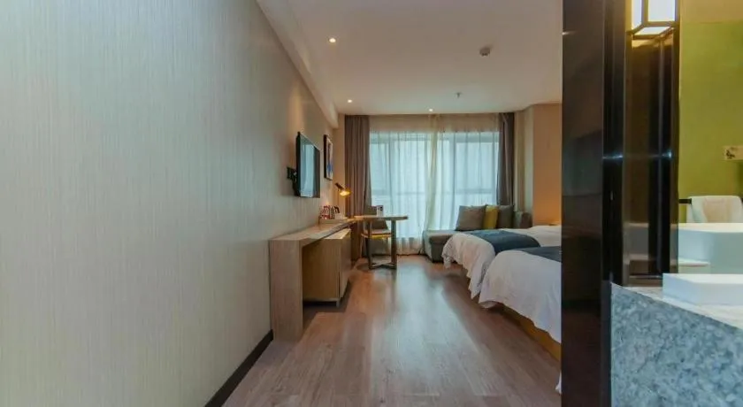 Bed in Echarm Hotel Guiyang International Convention & Exhibition Center