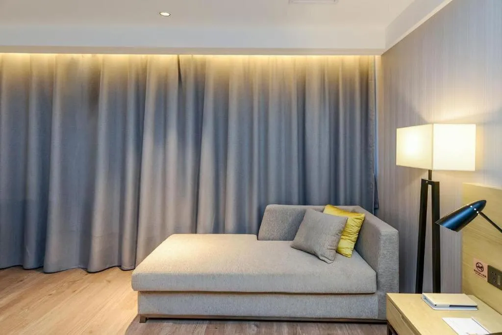 Bed in Echarm Hotel Guiyang International Convention & Exhibition Center