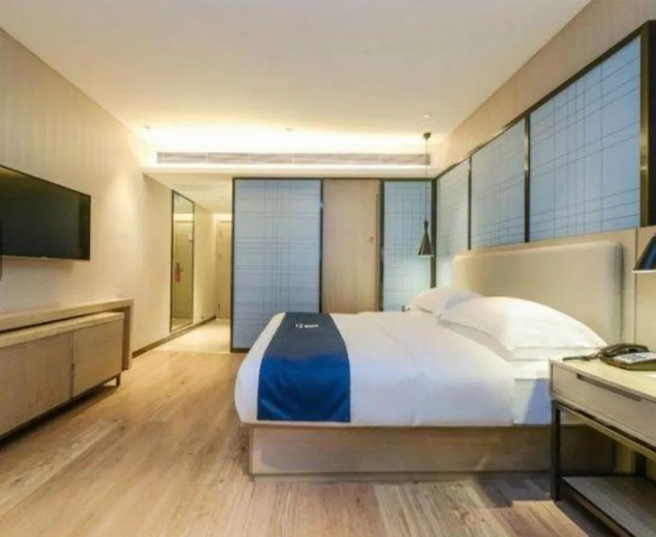 Bed in Echarm Hotel Guiyang International Convention & Exhibition Center