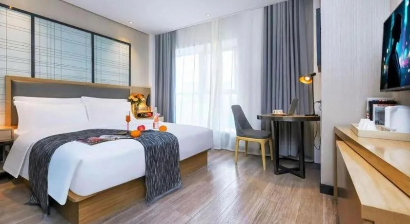 Bed in Echarm Hotel Guiyang International Convention & Exhibition Center