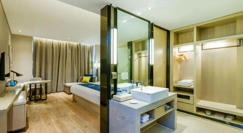 Bed in Echarm Hotel Guiyang International Convention & Exhibition Center