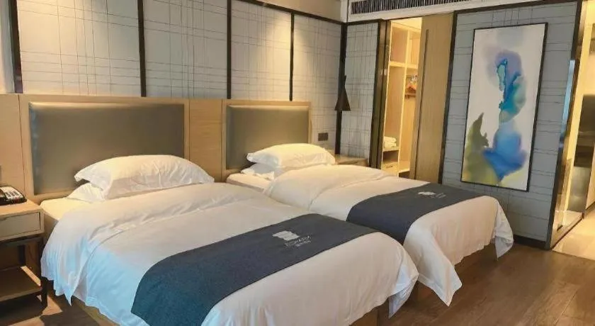 Bed in Echarm Hotel Guiyang International Convention & Exhibition Center