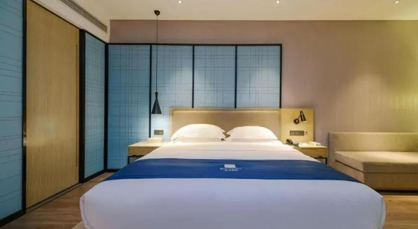 Bed in Echarm Hotel Guiyang International Convention & Exhibition Center