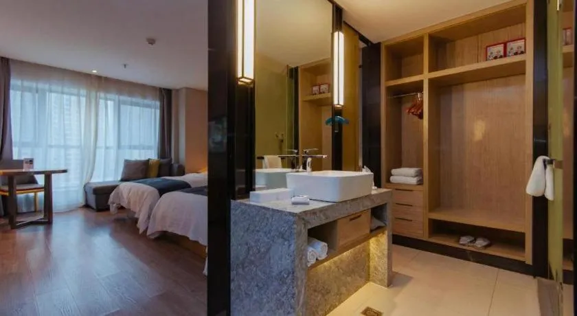 Bed in Echarm Hotel Guiyang International Convention & Exhibition Center