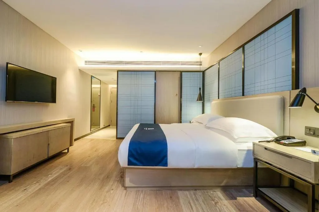 Bed in Echarm Hotel Guiyang International Convention & Exhibition Center