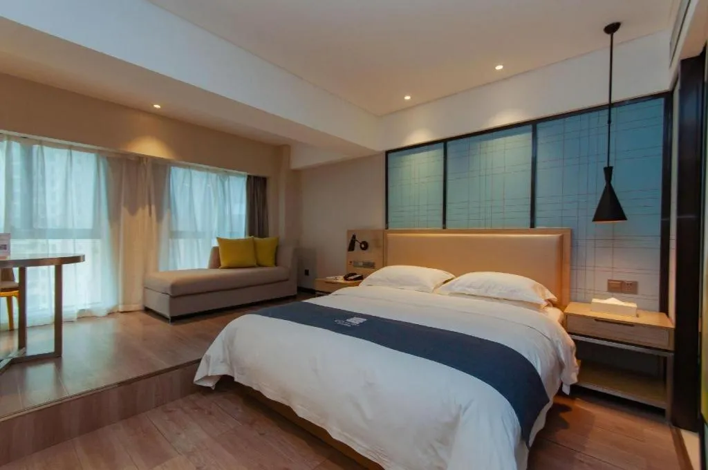 Bed in Echarm Hotel Guiyang International Convention & Exhibition Center