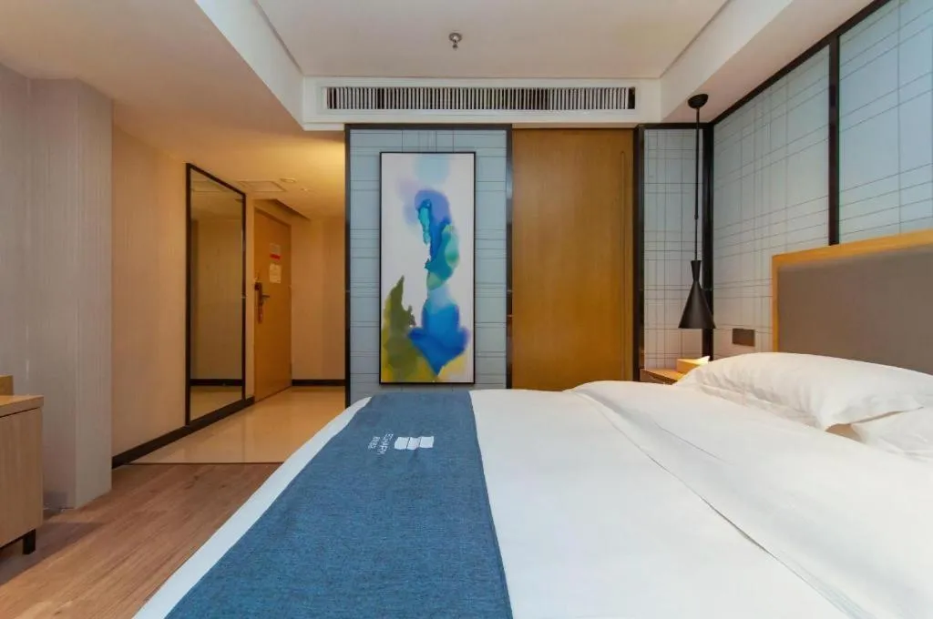 Bed in Echarm Hotel Guiyang International Convention & Exhibition Center