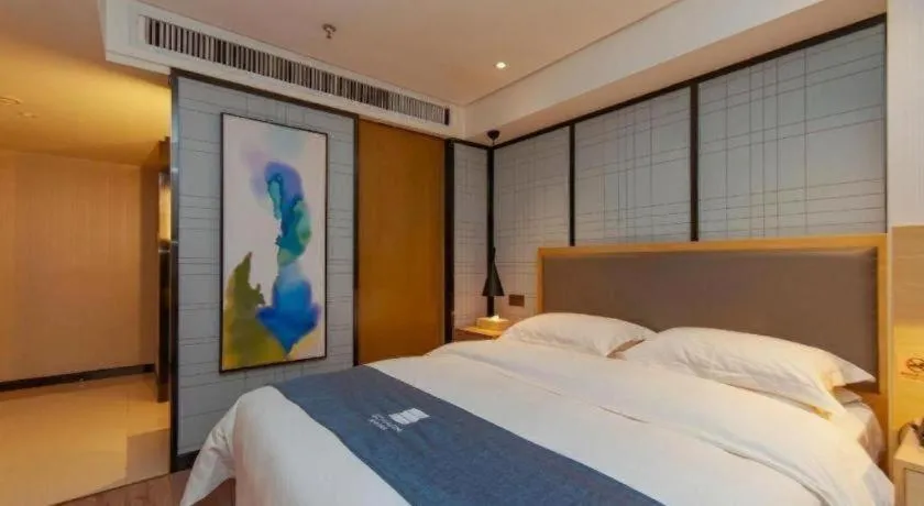 Bed in Echarm Hotel Guiyang International Convention & Exhibition Center