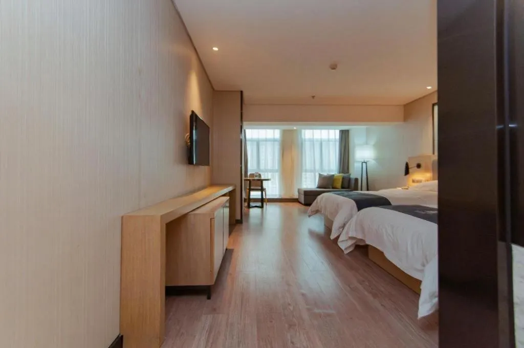 Bed in Echarm Hotel Guiyang International Convention & Exhibition Center