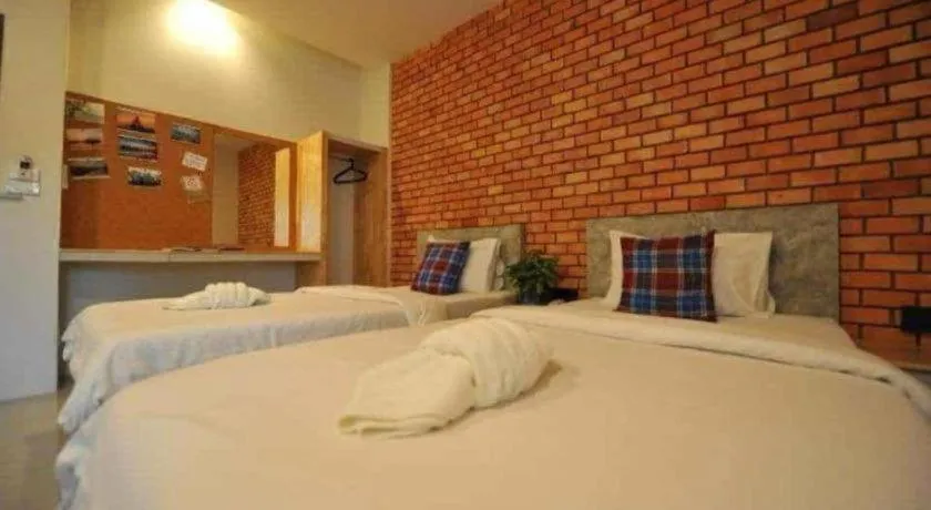 Bed in Nata Resort Chanthaburi II