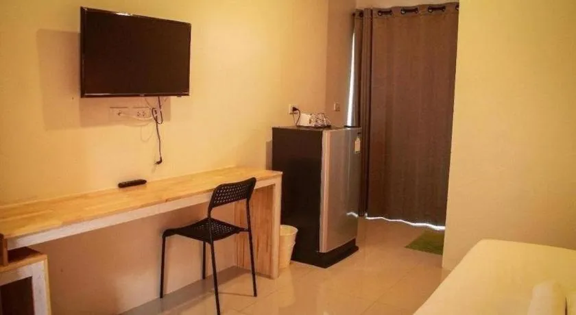 Bed in Nata Resort Chanthaburi II