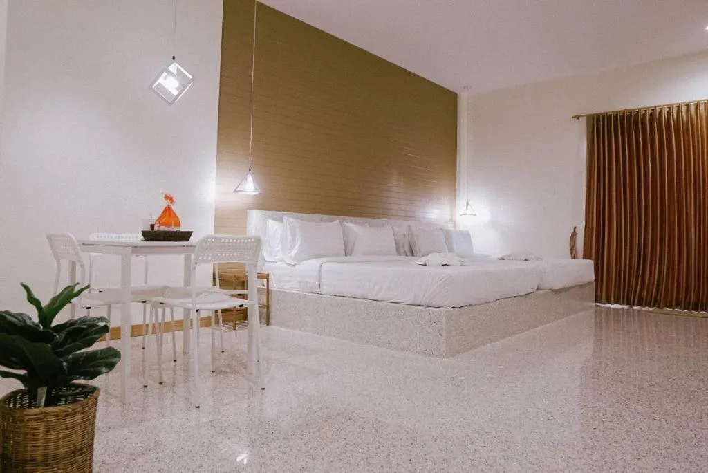 Bed in Nata Resort Chanthaburi II