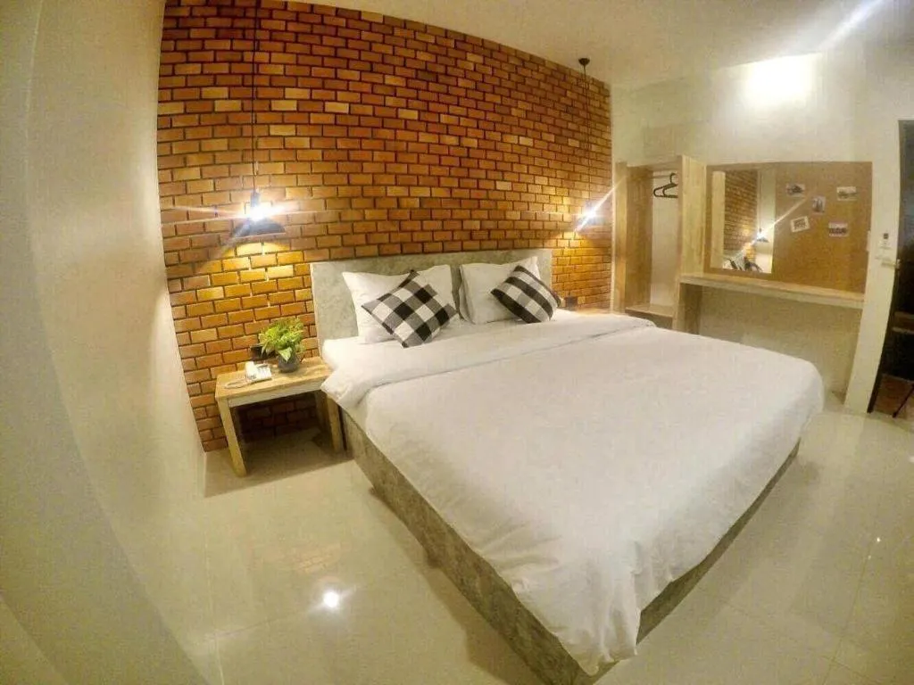 Bed in Nata Resort Chanthaburi II