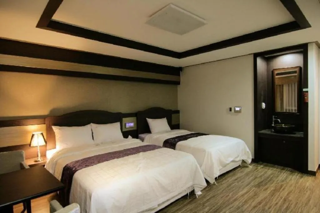 Bed in Benikea Ariul Hotel