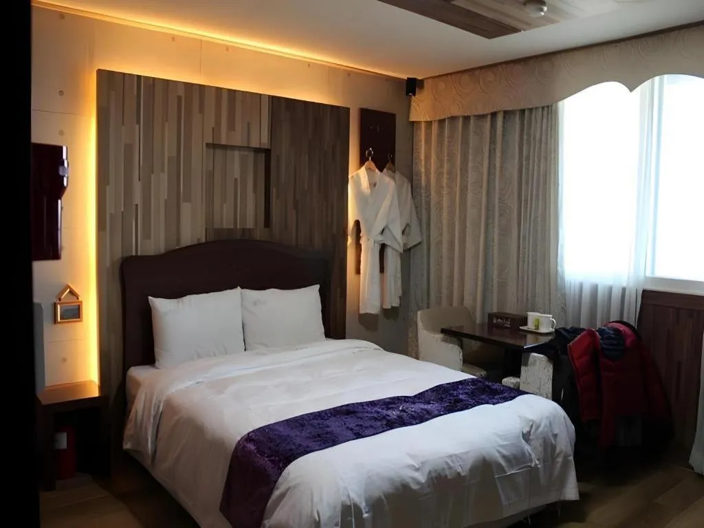 Bed in Benikea Ariul Hotel