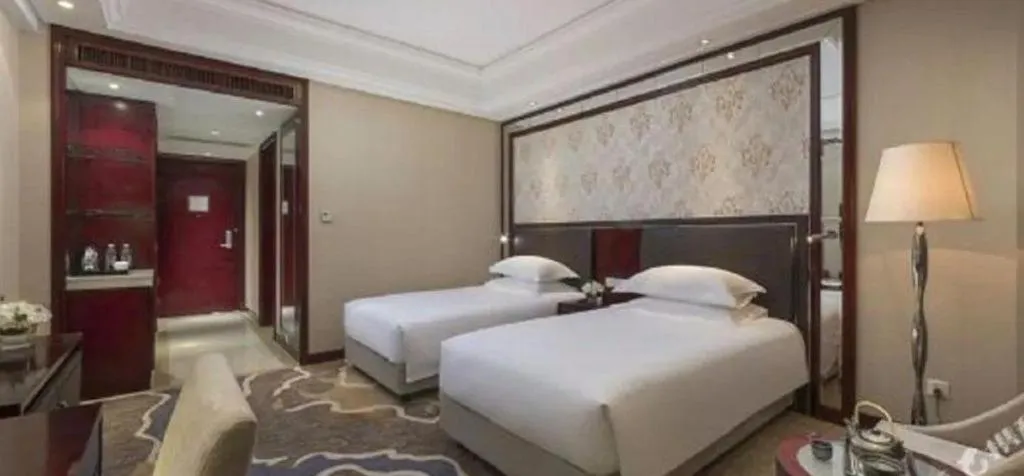 Bed in Maison New Century Hotel Cixi