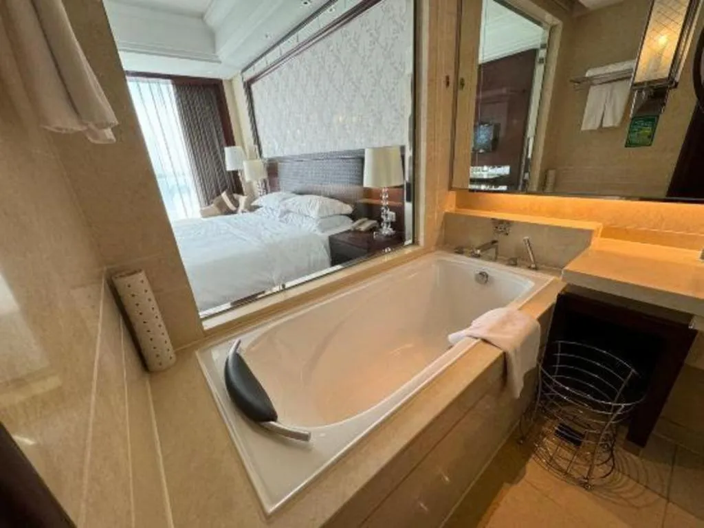 Bed in Maison New Century Hotel Cixi