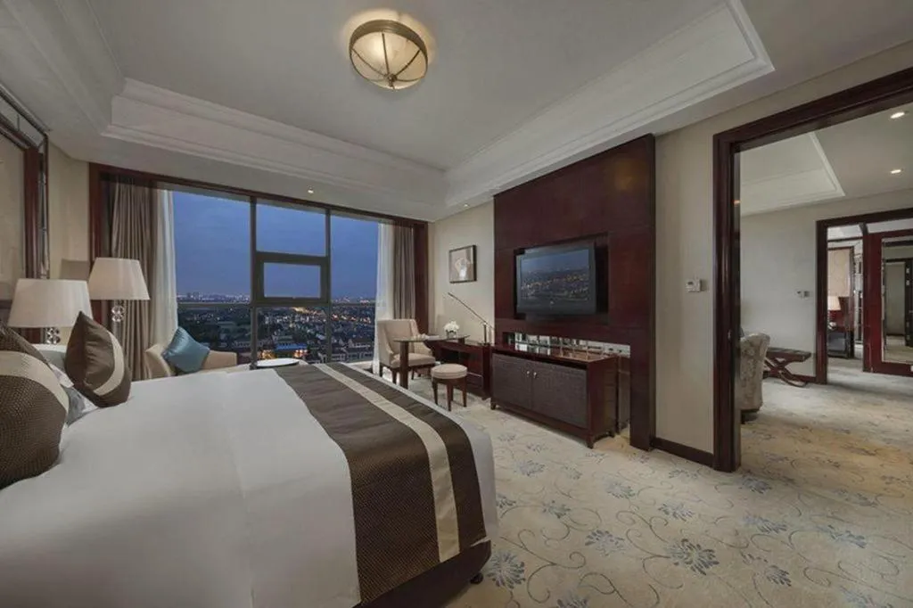 Bed in Maison New Century Hotel Cixi