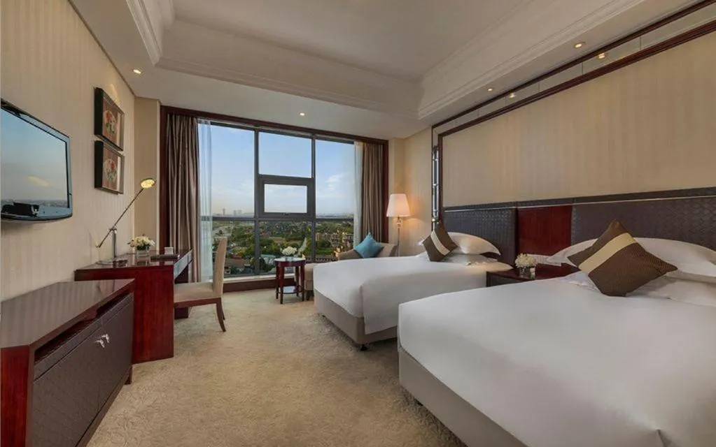 Bed in Maison New Century Hotel Cixi