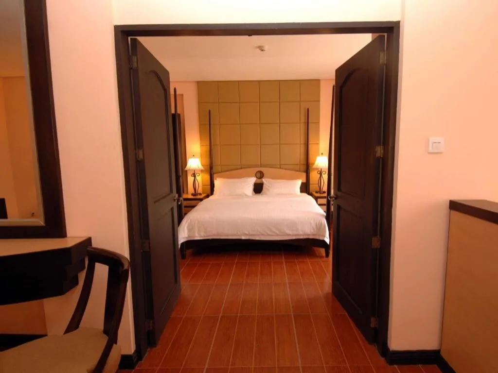 Bed in Planta Centro Bacolod Hotel & Residences