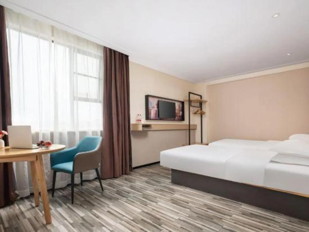 Bed in City Comfort Inn Liuzhou Beique Road Huang Village