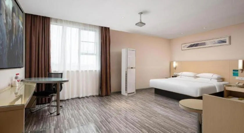 Bed in City Comfort Inn Liuzhou Beique Road Huang Village