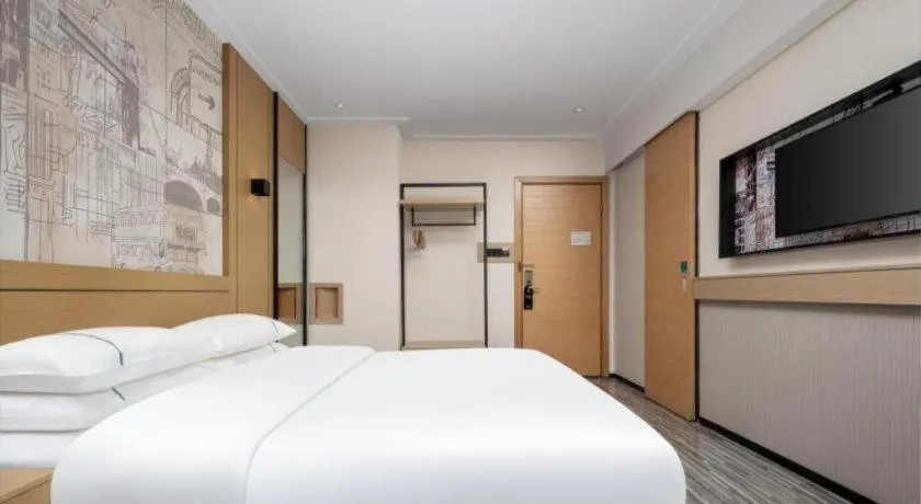 Bed in City Comfort Inn Liuzhou Beique Road Huang Village