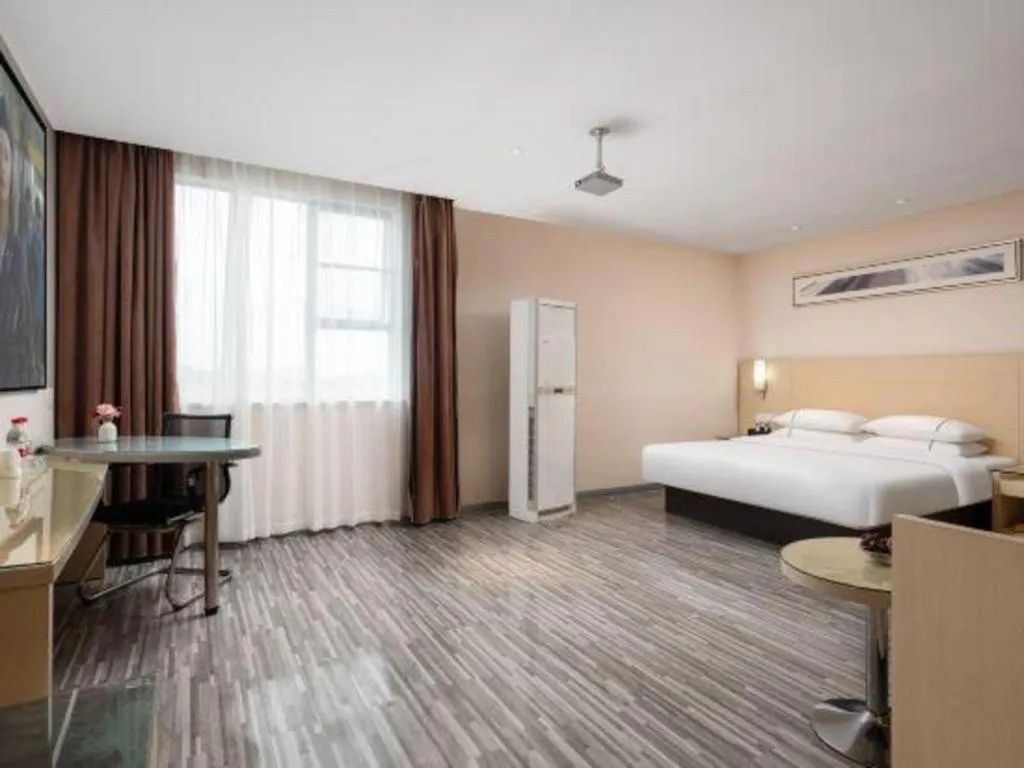 Bed in City Comfort Inn Liuzhou Beique Road Huang Village