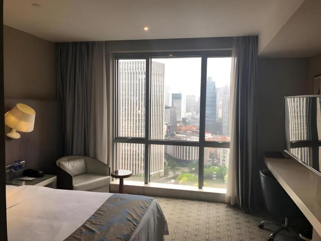 Bed in Shanghai Bund South China Harbour View Hotel