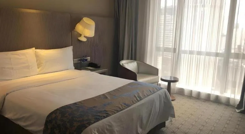 Bed in Shanghai Bund South China Harbour View Hotel