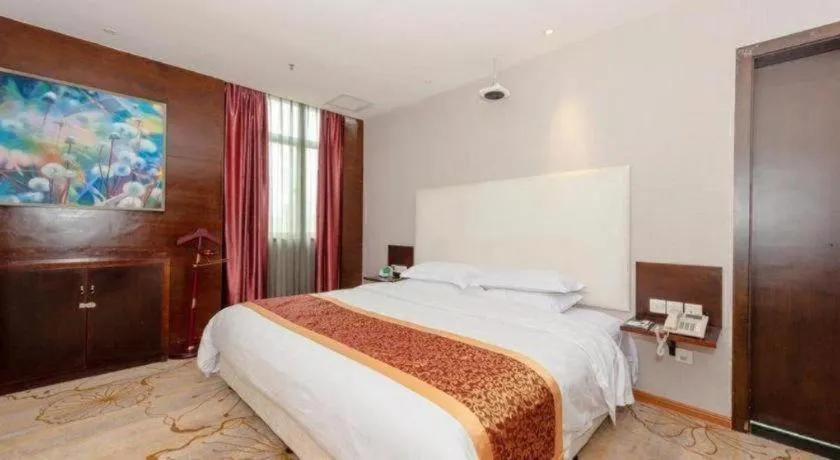 Bed in Xiamen Blue Peninsula Hotel