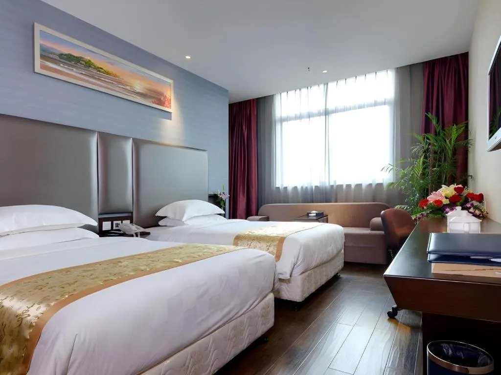 Bed in Xiamen Blue Peninsula Hotel