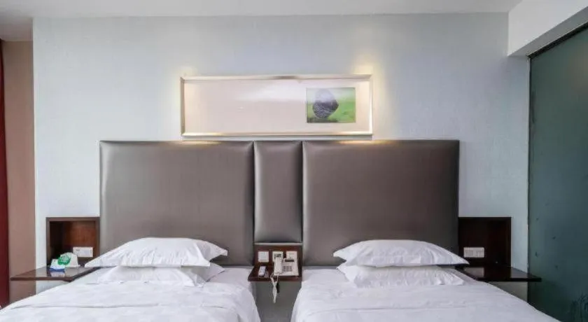 Bed in Xiamen Blue Peninsula Hotel