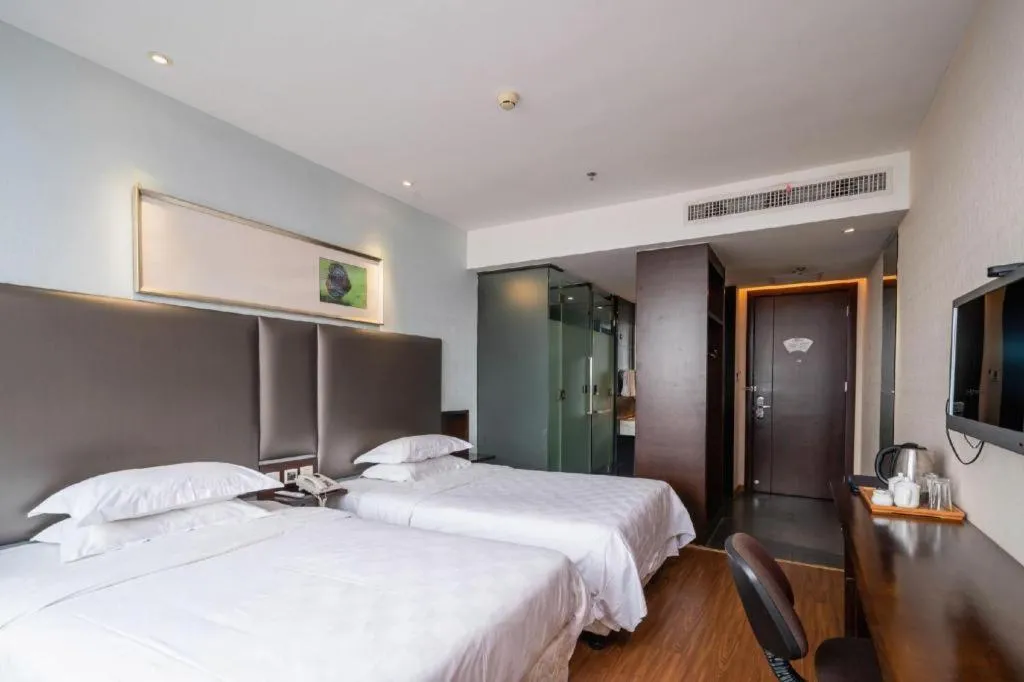 Bed in Xiamen Blue Peninsula Hotel