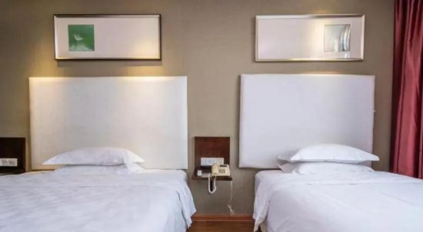 Bed in Xiamen Blue Peninsula Hotel