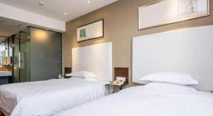 Bed in Xiamen Blue Peninsula Hotel