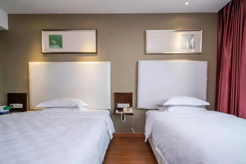 Bed in Xiamen Blue Peninsula Hotel