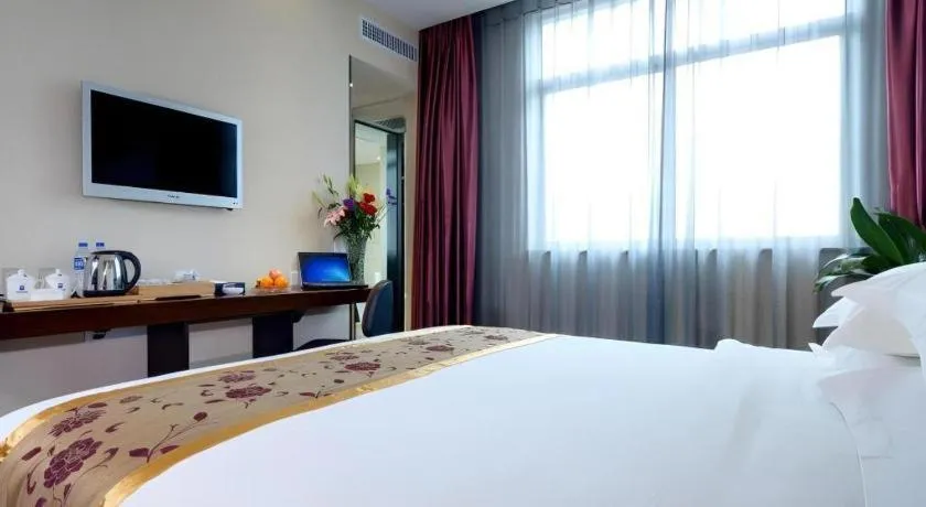 Bed in Xiamen Blue Peninsula Hotel