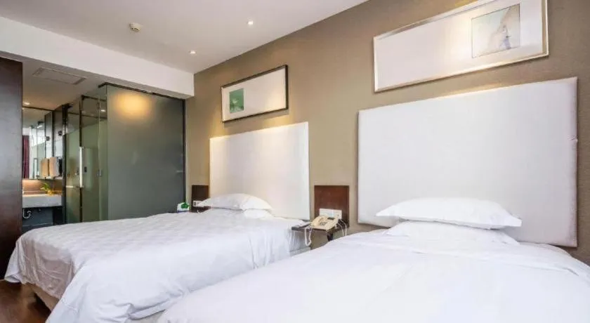 Bed in Xiamen Blue Peninsula Hotel