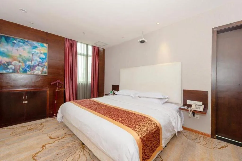 Bed in Xiamen Blue Peninsula Hotel