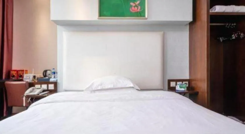 Bed in Xiamen Blue Peninsula Hotel