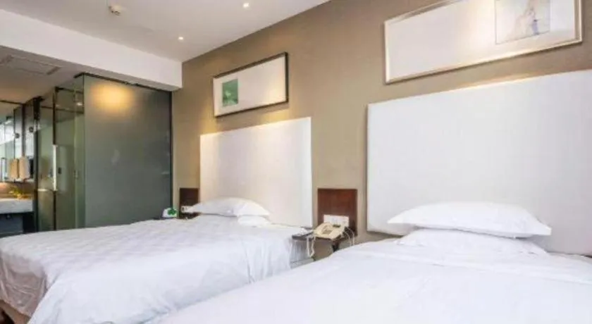 Bed in Xiamen Blue Peninsula Hotel