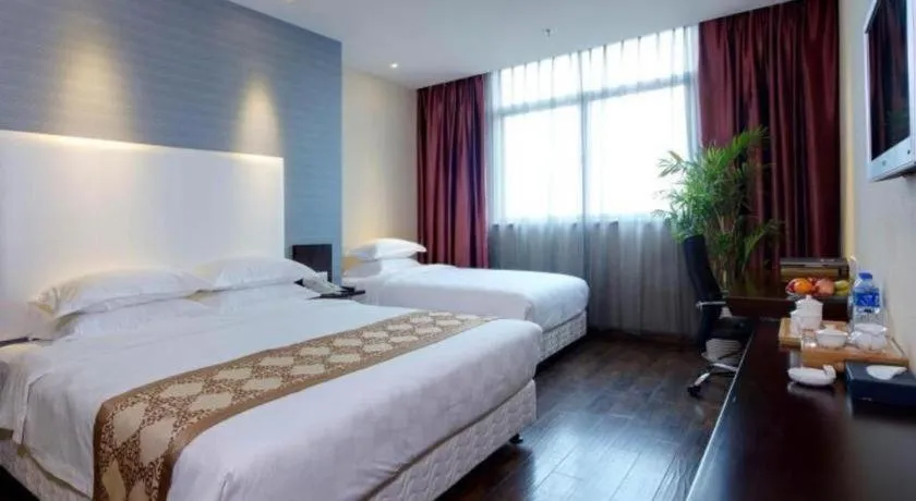 Bed in Xiamen Blue Peninsula Hotel