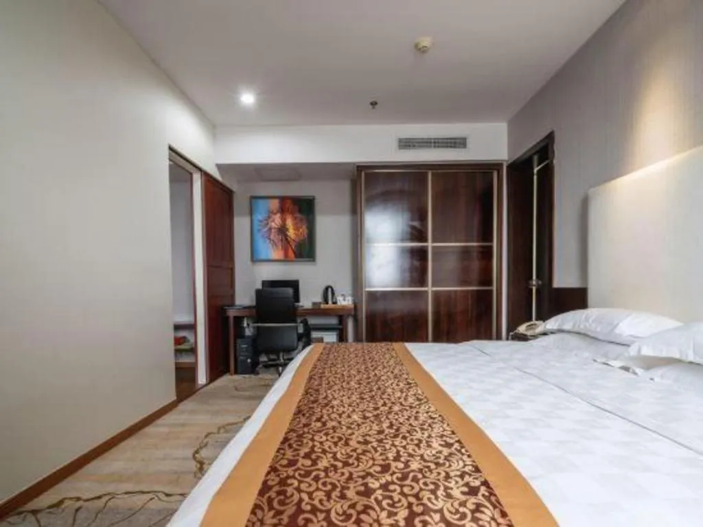 Bed in Xiamen Blue Peninsula Hotel