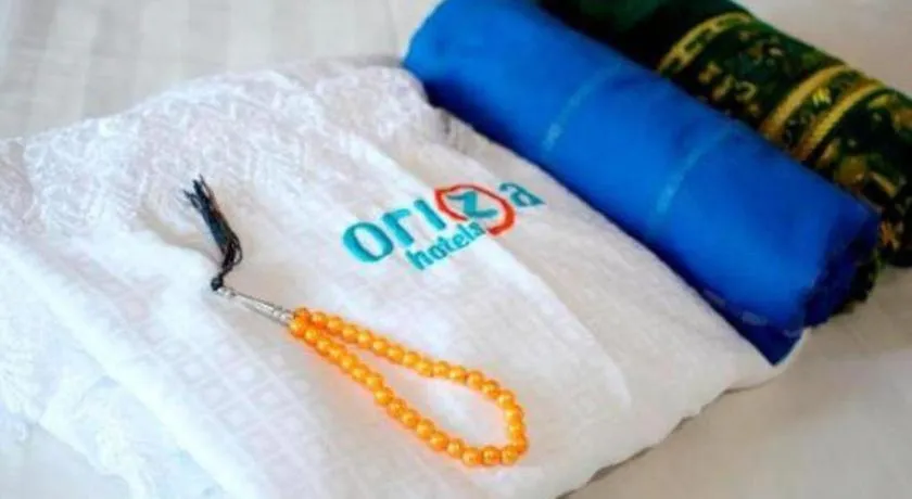 Bed in Oriza Hotel Surabaya