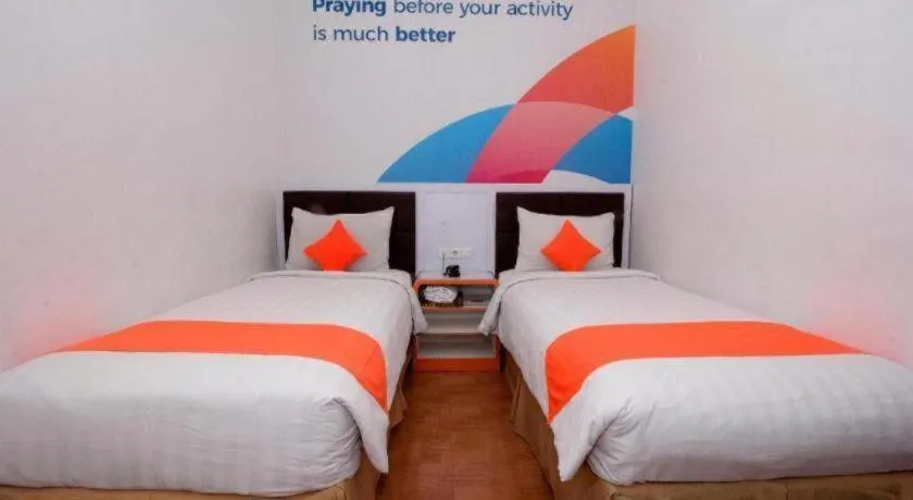 Bed in Oriza Hotel Surabaya