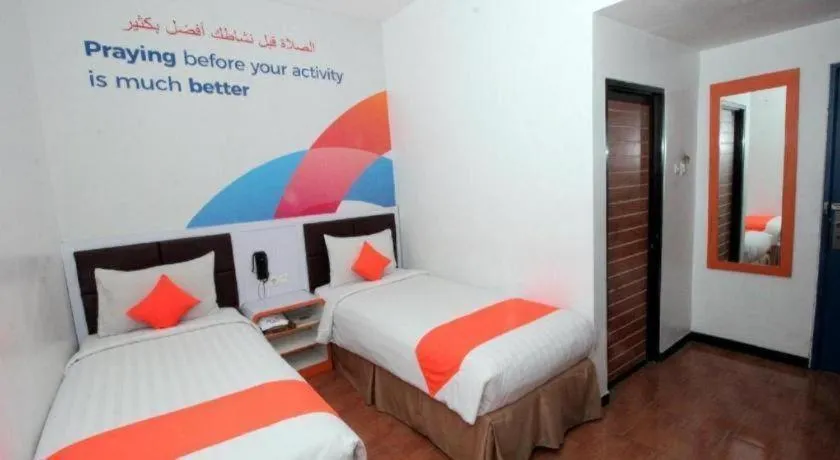 Bed in Oriza Hotel Surabaya