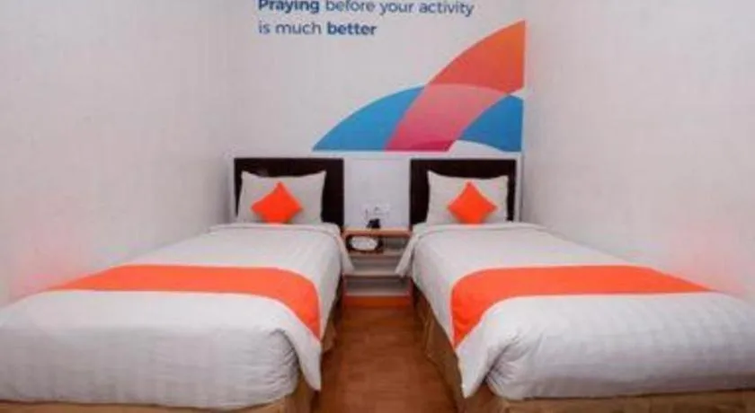 Bed in Oriza Hotel Surabaya