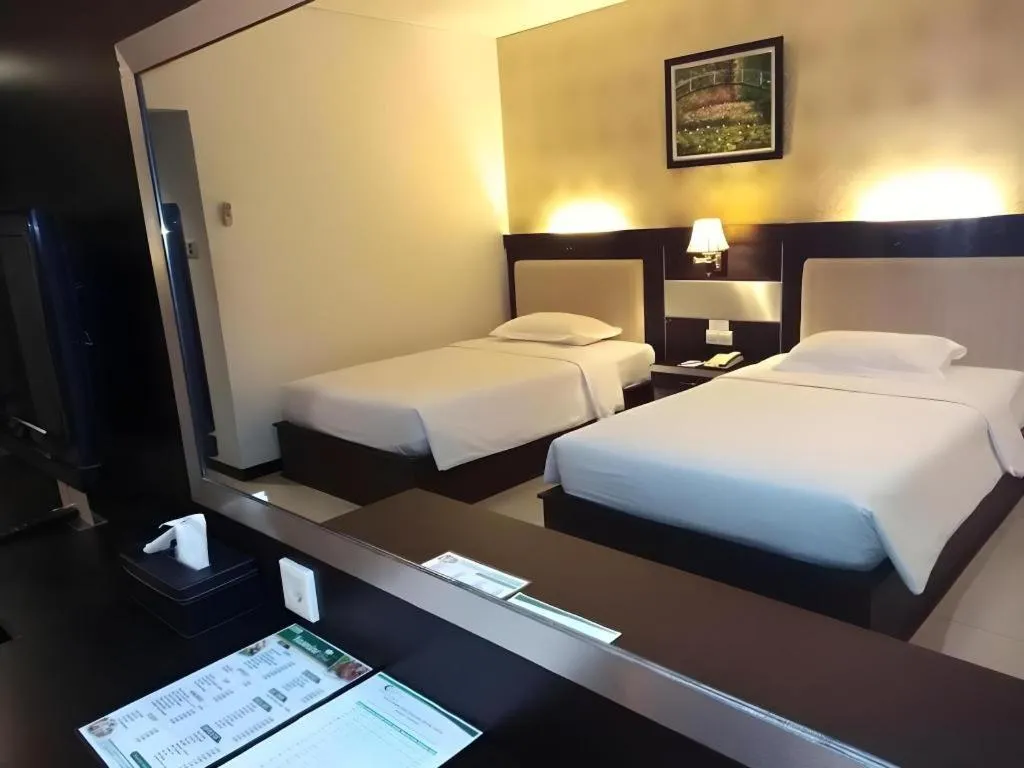 Bed in Zahra Syariah Hotel Kendari