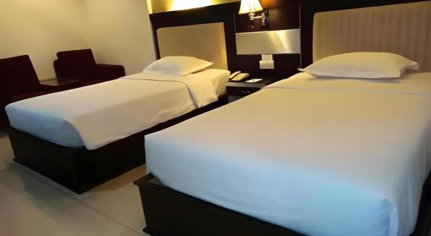Bed in Zahra Syariah Hotel Kendari